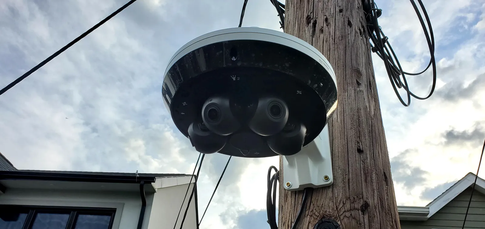 Multi-sensor security camera mounted on an exterior pole